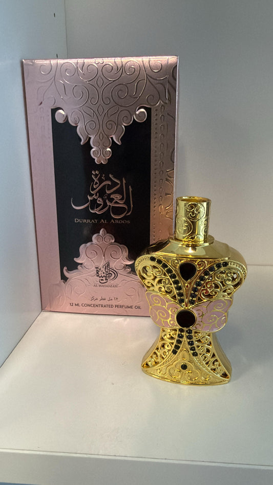 Al Wataniah Durrat Al Aroos 12ml concentrated perfume oil bottle